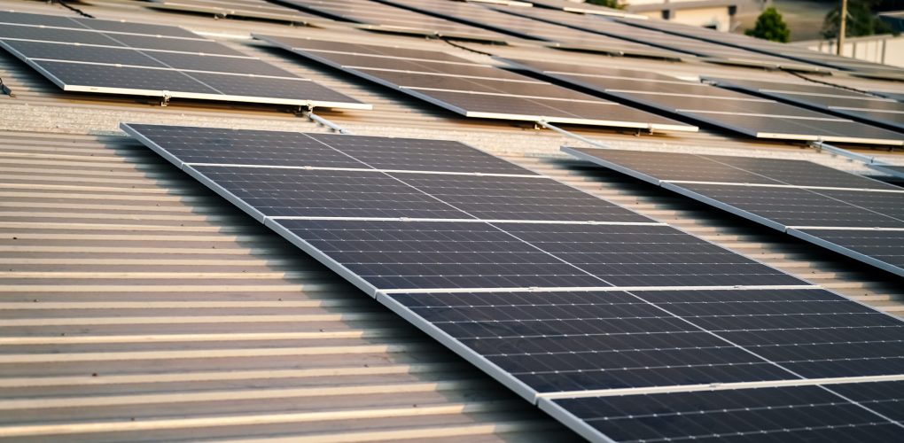 Technology solar cell, Engineer service check installation solar cell on the roof of factory. technician checks the maintenance of the solar panels, engineering team working on checking and maintenance in solar power plant to innovation of green energy for life on factory roof.